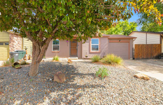 Updated 4-Bedroom Home with Central A/C & Xeriscaped Yard photos photos