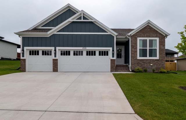 NEW LUXURY 4 BEDROOM 3 CAR GARAGE HOME IN OZARK MO! AVAILABLE 7/01/2026 photos photos
