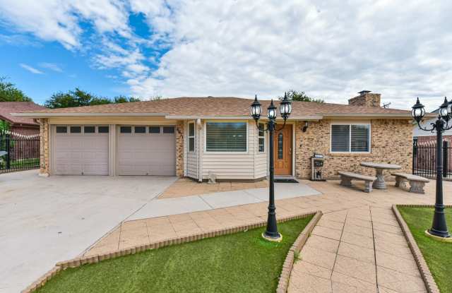 A Home with a Jacuzzi, Sunroom, and Space to Unwind Gallery 3