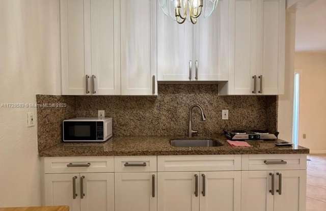 7641 Raleigh St photos photos