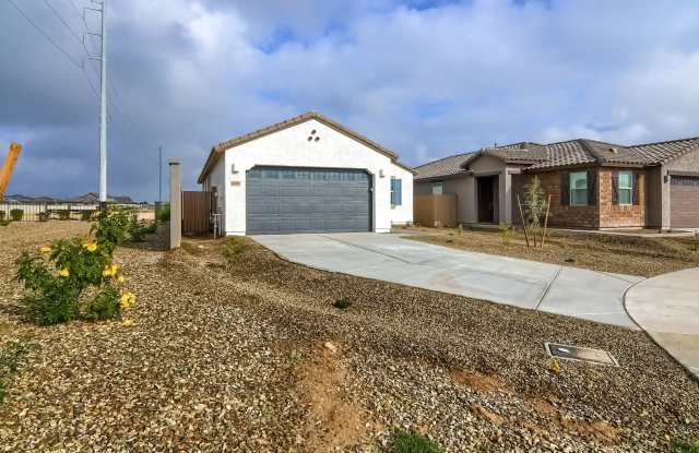 Charming 3-Bedroom Home with Modern Amenities inside a great community in Waddell, AZ photos photos