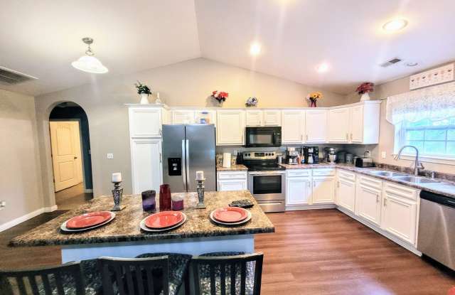 1 story home with a fence Gallery 4