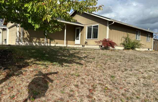 Three Bedroom Home with an Attached Garage - Move in Special Gallery 1
