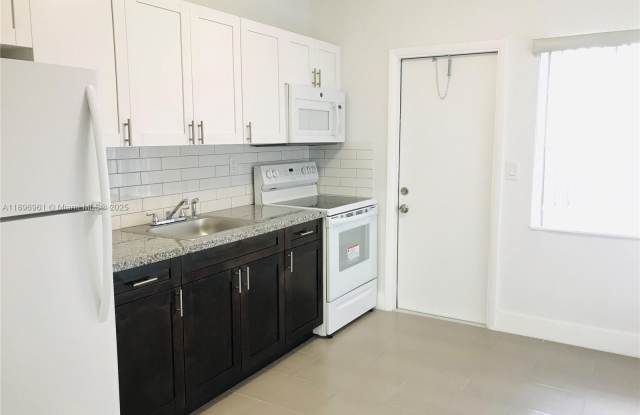 5454 NW 5th Ave photos photos