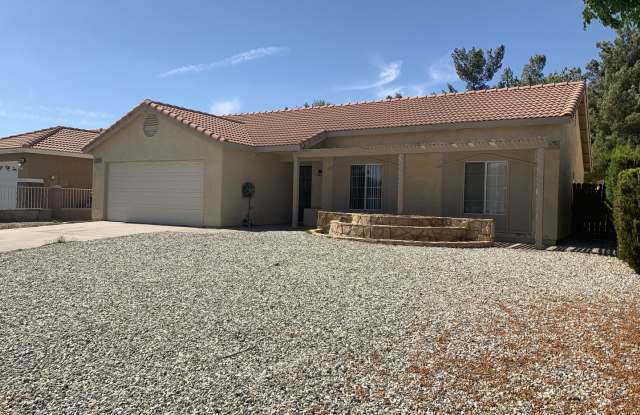 Adelanto Home- 3 Bedrooms, 2 Bathrooms, Laminate Floors, Large Back Yard - 10624 Palmyra Street, Adelanto, CA 92301