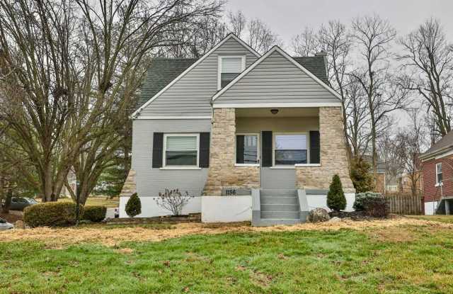 DELHI TWP- Spacious 4 bedroom 3 bath Cape Cod with garage photos photos