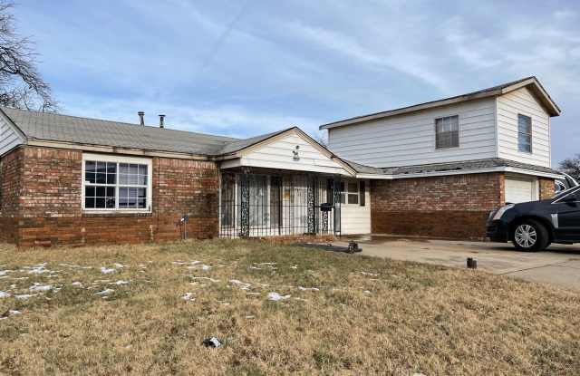 Spacious Split-Level 4-Bedroom Home with Tons of Potential in South OKC! photos photos