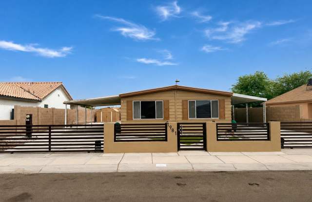 Fully Fenced 3 Bedroom Home with Covered Parking and Landscaped Property Gallery 1