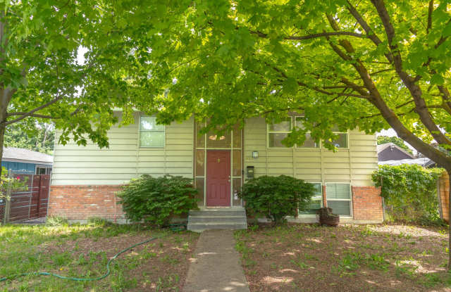 Spacious and versatile 6-bedroom, 2-bath split-level home photos photos