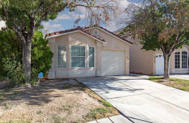 Single story home in gated SW neighborhood with quick Strip access and new a/c unit Gallery 4