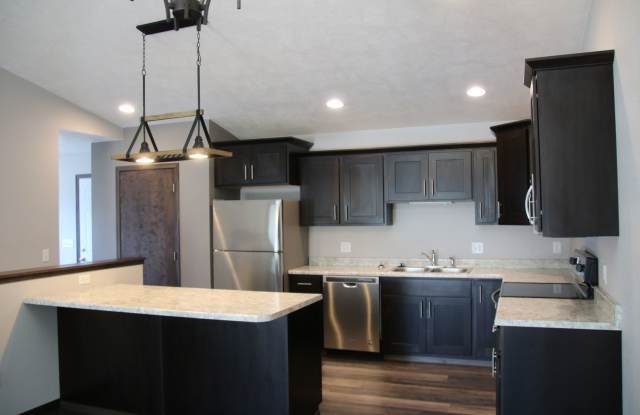 Spacious Cul-De-Sac Townhomes with Modern Comforts in East Sioux Falls! photos photos