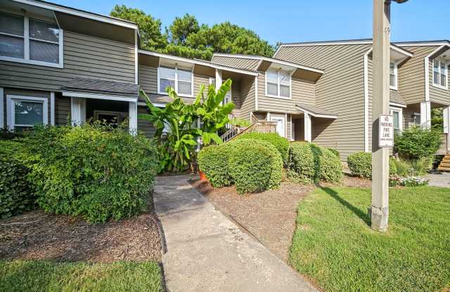 Water Views, Sunlit Spaces & Beach Days Ahead—Find YOUR HOME in Herons Cove! 2BR/2.5BA Condo available NOW Gallery 1