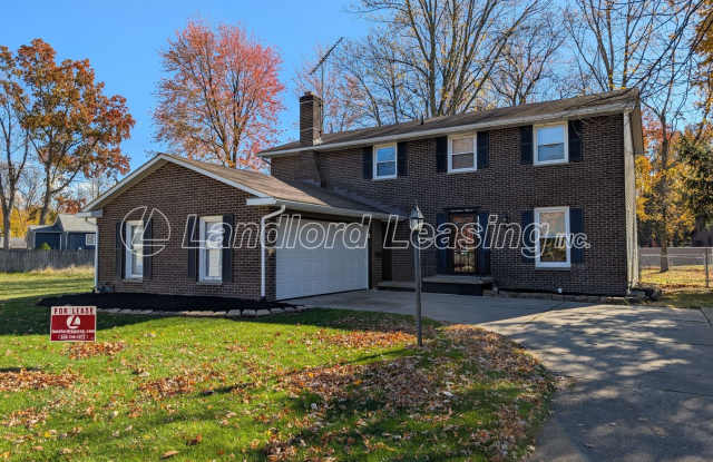 Spacious 4-Bedroom Colonial on Beautiful Wooded Lot - 1715 Fairway Drive, Lorain, OH 44053