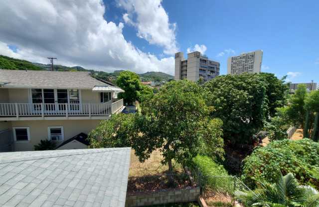 Spacious 2-bedroom, 1-bathroom unit with 1 covered parking stall! photos photos