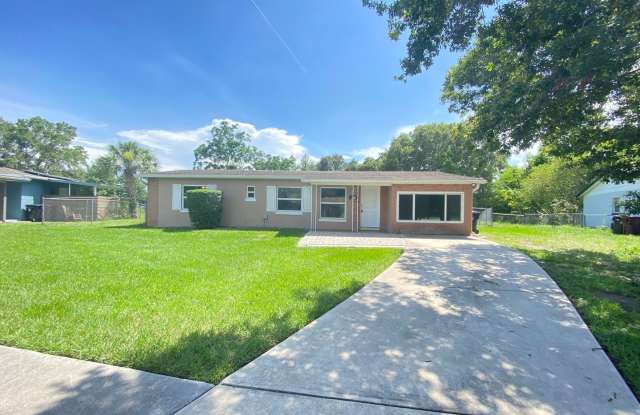 Modern 3B/2B home in traditional Orlando neighborhood. HUGE backyard with water views. photos photos