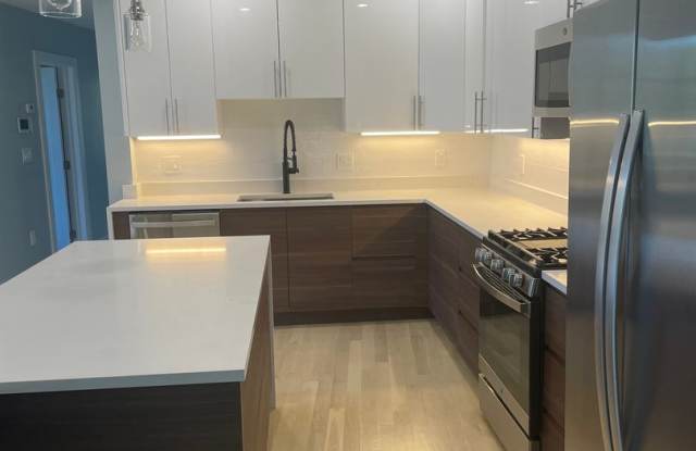 Beautiful brand new three bedroom, Laundry in unit photos photos