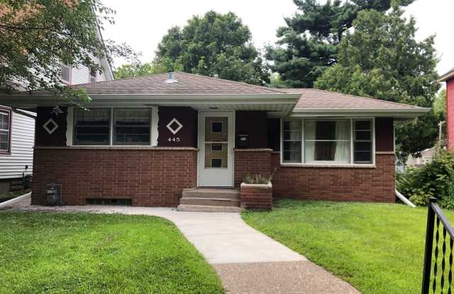 House Available September 1, Hardwood Floors, Lower Family Room, 2 Car Garage, Fenced Yard - 445 Herschel Street, St. Paul, MN 55104