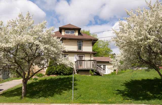 Bright, beautiful home with 3 garage spaces & tons of storage! photos photos