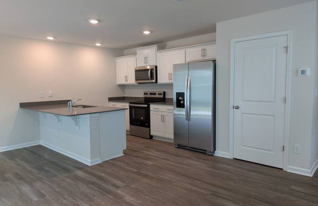 ***50% off the first full month of rent*** Beautiful 4 Bedroom, 2.5 Bathroom Townhome in Mallard Creek! Gallery 3