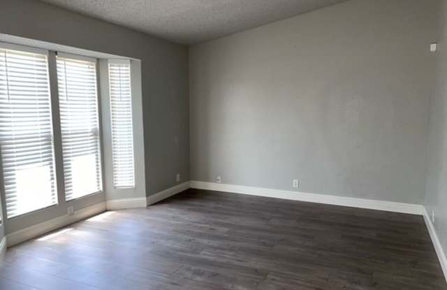Laminate flooring throughout. Solar panels. Low maintenance yard. Gallery 3