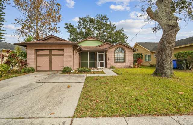 Great Hampton Park 4BR/2BA with Bonus Room and Fenced Yard - 12715 Trowbridge Lane, Carrollwood, FL 33624