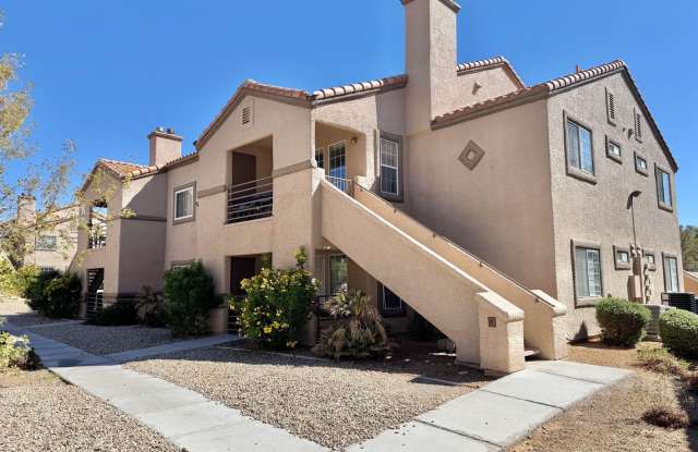 Welcome to this inviting 2-bedroom, 2-bathroom single-story condo Gallery 1
