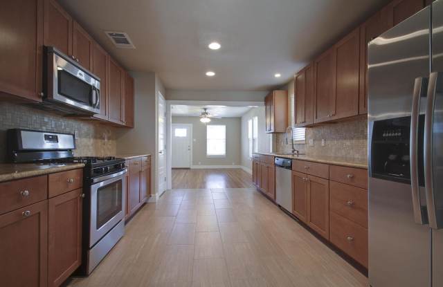 UT PRE-LEASE: Newly Remodeled West Campus Home , 6 bed / 3 bath, short walk/bike to UT campus photos photos