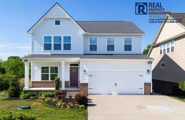 Great 4 bd 2.5 ba with attached garage and large deck! photos photos