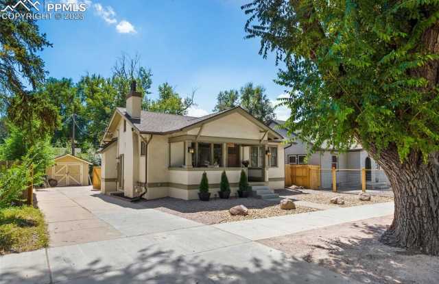Updated Craftsman, minutes to downtown - 4 bedroom, 2 bath, alley parking + garage Gallery 1