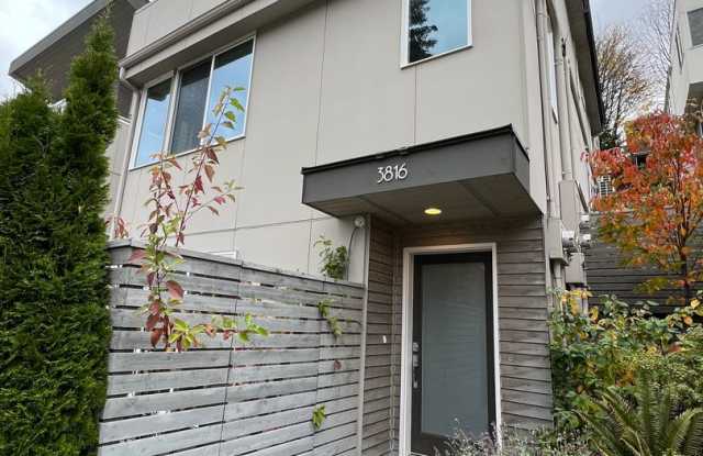 Amazing modern townhouse tucked away in private Pigeon Point! photos photos