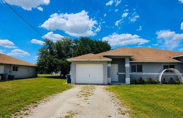 3 BR / 2 BA Duplex Conveniently Located in Lehigh Acres photos photos