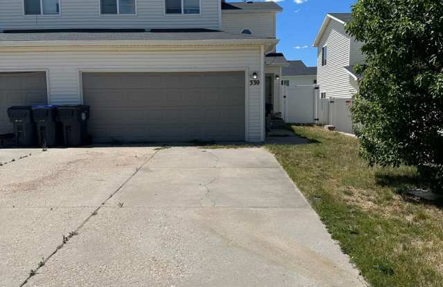 3 BEDROOM, 2.5 BATHROOM SOUTH PARK TWINHOME WITH ATTACHED 2 CAR GARAGE - 330 Arkel Way, Cheyenne, WY 82007