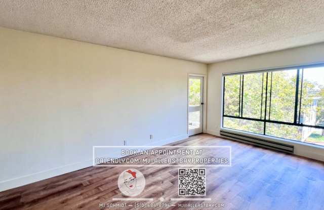 Beautiful sunny top floor condo, includes Water/Garbage/Parking and more! photos photos