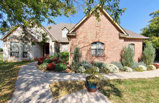 Beautiful 4Bedroom Home tucked away on a quiet cul-de-sac in Coffee Creek! Edmond Schools! Available Now!!! photos photos