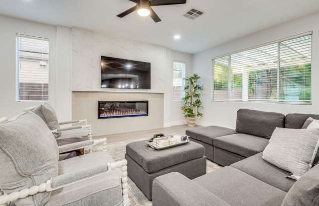 FULLY FURNISHED! Exudes sophistication with designer touches throughout photos photos