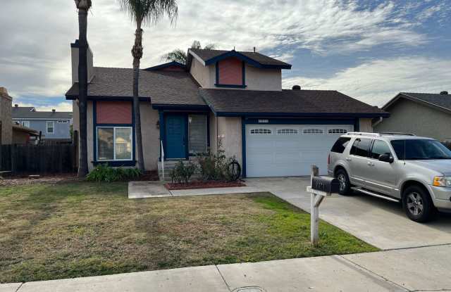 Beautiful 4 Bed | 3 Bath Home in Santee with Downstairs Bedroom & Full Bath! photos photos