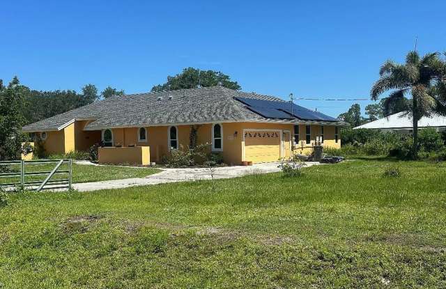 Beautifully Renovated Pool Home in The Acreage - 3bed | 2.5bath photos photos