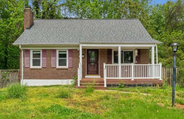 Adorable 4BR/3BA Cape Cod on a Generous 0.4-Acre Lot photos photos