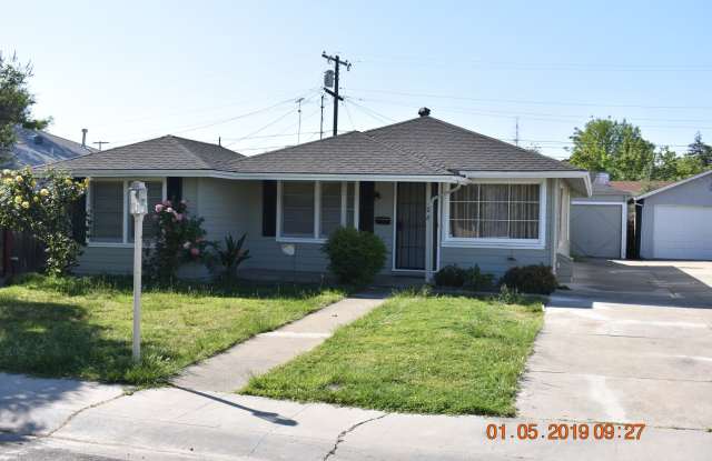 Charming Three Bedroom Home with New Carpet/ Built-ins/ Miracle Mile photos photos