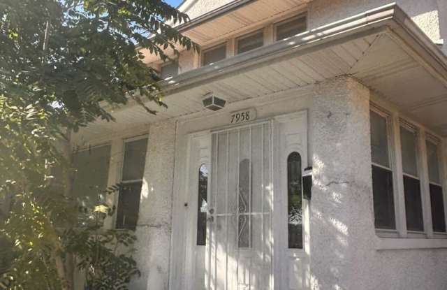 3-Bedroom Corner Home with Hardwood Floors, Sunroom, and Fenced Backyard Gallery 1