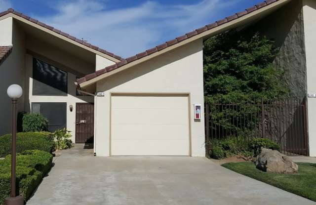 Northwest single level condo offering many nice amenities. Garage, laundry, patio + a good floor plan. photos photos