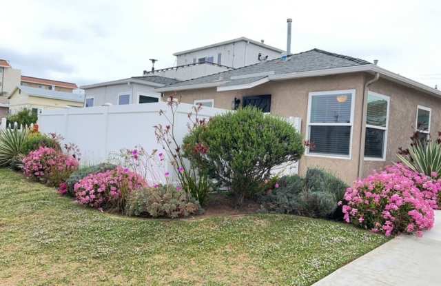 Remodeled One Bedroom Apartment Home! 1 Block from the Beach! Private Garage! photos photos