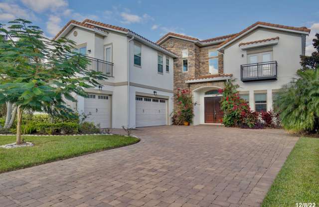 Stunning 4/5 Executive Pool Home in the Guard-Gated Golf Course Community of Eagle Creek - Orlando! photos photos
