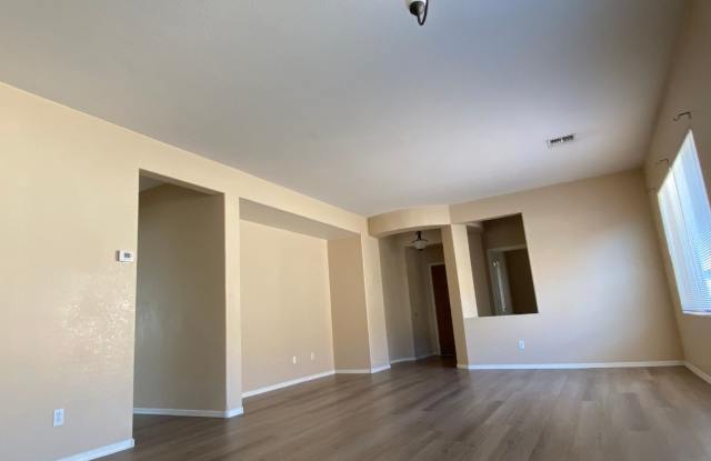 Beautiful plank flooring in this 4 bedroom home in Avondale Gallery 4