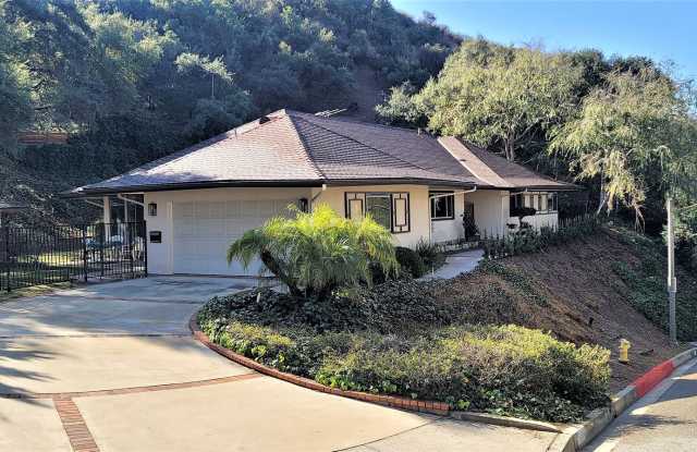 Classic, Midcentury 3 bedroom with Den, 2.5 bath home nestled into hillside with secluded backyard. Mountain views from bedrooms. photos photos