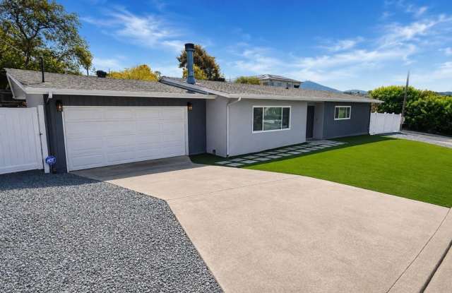 Updated 3 Bedroom Home with Modern Finishes, Private Yard & 2 Car Garage photos photos