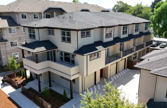 4 Bedroom / 4 bath New Townhome. Every bedroom is its own Master Suite with your own full bathroom, walk in closet and A/C unit. Full-size washer and dryer in your unit. Gallery 3