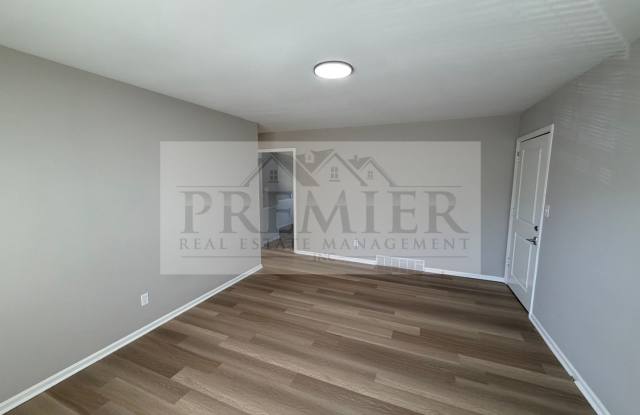 8418 Travis Lane Overland Park KS - Rent 1700 - 3 bed / 1 bath apartment - with open garage space / storage / washer / dryer Gallery 4
