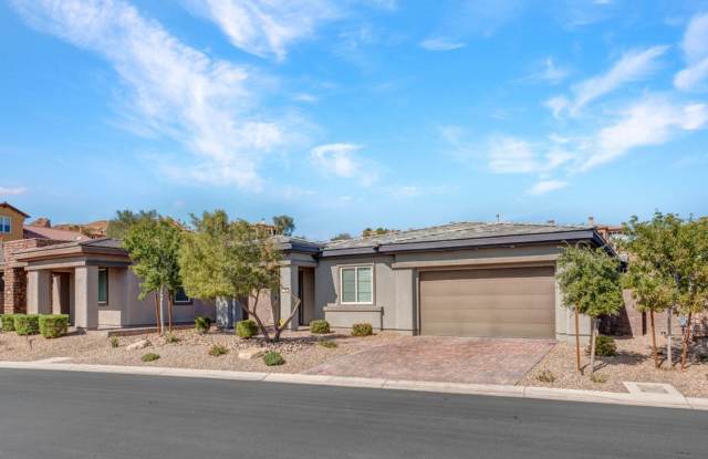 Immaculate 2600 sq. ft. single story 2 bed, 2 bath with modern glass framed office/den right on the GOLF COURSE in stunning Lake Las Vegas! photos photos