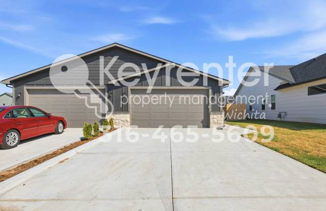 New 3-Bedroom Duplex with 2-Car Garage, Fenced Yard & Lawn Care Included Gallery 1